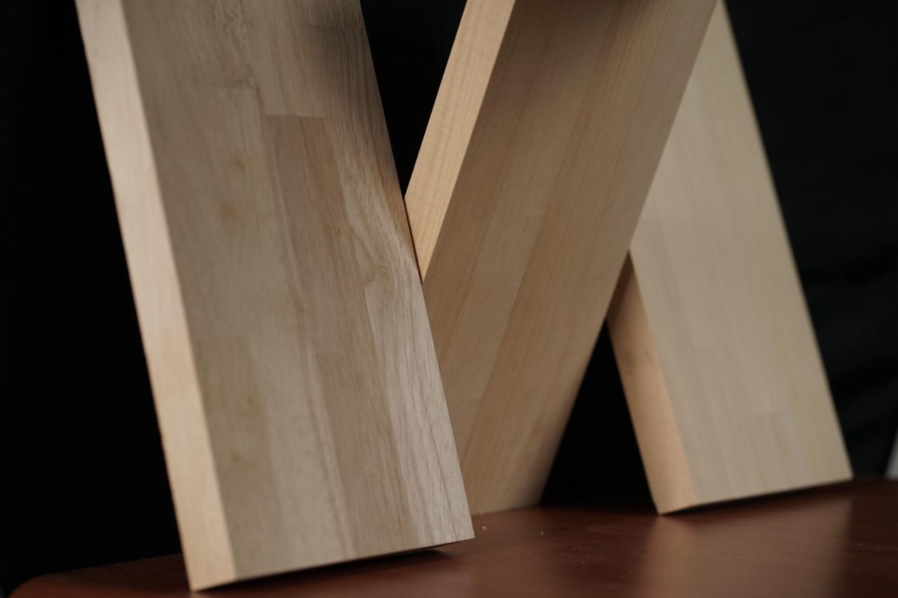 FJLB boards standing — dark studio